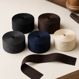 Assortment of 38 mm rayon/cotton grosgrain hat ribbon rolls in core colors